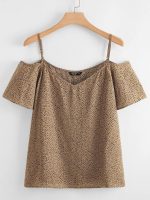 Off-the-shoulder shirt with polka dot print